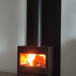 Installation poêle à bois avec conduit maçonné intérieur